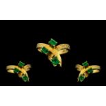 18ct Gold - Attractive 3 Stone Emerald Set Ring of Contemporary Design. The Columbian Emeralds of