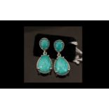 Natural Amazonite Drop Earrings, pear cut cabochon solitaires of amazonite suspended below oval cuts