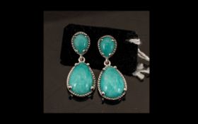 Natural Amazonite Drop Earrings, pear cut cabochon solitaires of amazonite suspended below oval cuts