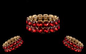 Bright Red Crystal Bracelet comprising a double row of large, dazzling red, square cushion crystals,