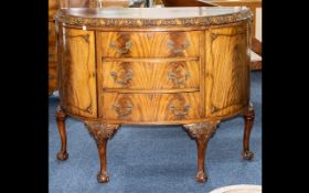Early to Mid 20thC Bow Fronted Commode with three central drawers between two storage cabinets.