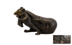 Japanese Signed Bronze of a Rat carrying a sack on its shoulders. 20th Century, fully signed with