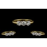 18ct Gold Attractive 3 Stone Diamond Set Ring fully hallmarked for 18ct - 750. The three round cut
