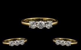 18ct Gold Attractive 3 Stone Diamond Set Ring fully hallmarked for 18ct - 750. The three round cut