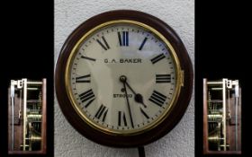 A 19th Century Mahogany Railway/School Clock enamelled dial with Roman numerals, marked G A Beker,