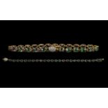 A Nice Quality and Attractive 9ct Gold Mystic Topaz Set Bracelet with diamond Set Clasp marked 9.