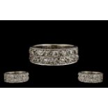 18ct White Gold Attractive Channel Set Diamond Ring - From the 1930's.Set with 20 old round