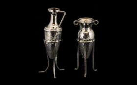 Two Silver Amphora Form Miniature Bud Vases Each Raised On Trefoiled Stand, One Of Planished