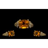9ct Gold Attractive Single Stone Orange Topaz Set Dress Ring the faceted topaz of excellent
