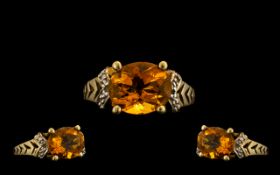 9ct Gold Attractive Single Stone Orange Topaz Set Dress Ring the faceted topaz of excellent