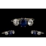 Platinum Set Superb Quality & Attractive Three Stone Sapphire & Diamond Set Dress Ring. Circa 1930s.