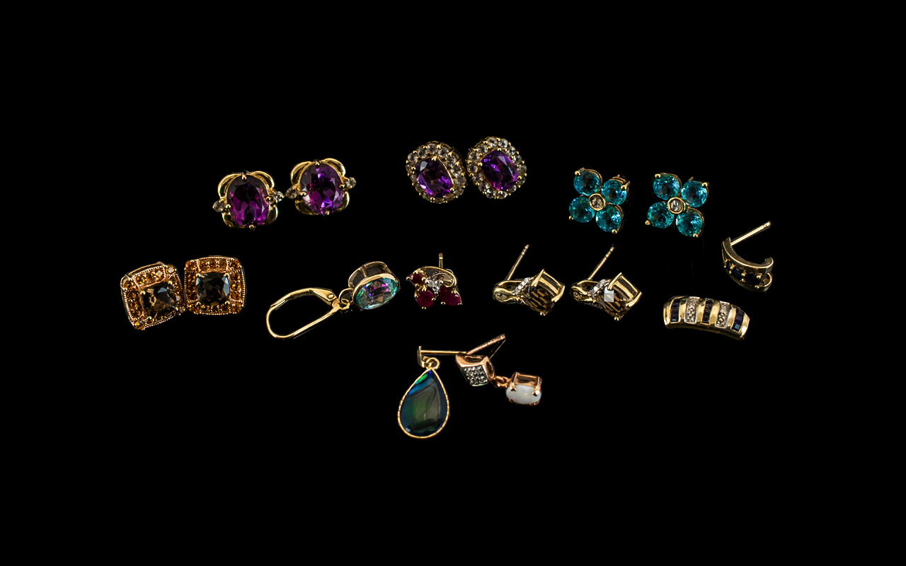 A Good Collection of Assorted 9ct Gold Stone Set Earrings. 16 in total, includes five pairs and