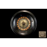 Roulette Wheel. Mid to early 20th Century Roulette wheel, Constructed of heavy dark wood with