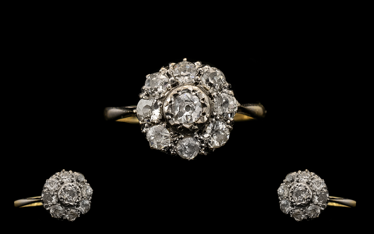 18 Carat Gold and Platinum Diamond Set Cluster Ring flower head setting. Circa 1920's. fully