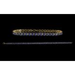 Ladies Good Quality Attractive Vermeil Tanzanite Set Line Bracelet set with forty tanzanites of