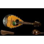 Fredo Albertini Italian Bowl Back Mandolin with eight strings and superb quality inlay work.