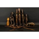 A Quantity of Carved Figures and Ornaments made for the Tourist market, spear tip, figural letter