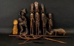 A Quantity of Carved Figures and Ornaments made for the Tourist market, spear tip, figural letter