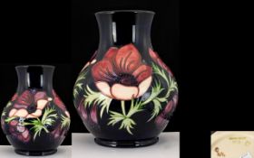 Walter Moorcroft - Signed Large Tubelined Globual Shaped Vase 'Clematis' Design on Blue Ground.