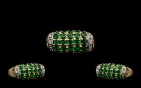 14 CT Gold Attractive Emerald & Diamond Set Ladies Ring. The 24 emeralds are of good colour est 1.20