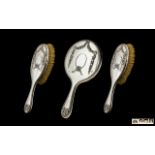 Ladies Sterling Silver 3 Piece Vanity Set comprising Hand Mirror and Two Brushes. All pieces in