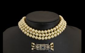 Art Deco Pearl Choker. Triple strand pearl choker / necklace with silver gem set clasp, please see