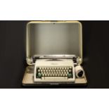 Olympia Typewriter. Vintage typewriter in hard carry case, please see accompanying image.