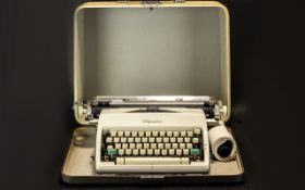 Olympia Typewriter. Vintage typewriter in hard carry case, please see accompanying image.