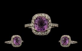 Contemporary 18ct White Gold Quality Amethyst & Diamond Set Dress Ring. Marked 18ct, the central