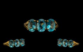 9ct Gold Attractive Three Stone Aquamarine Dress Ring The three aquamarines of about 1.00 carats