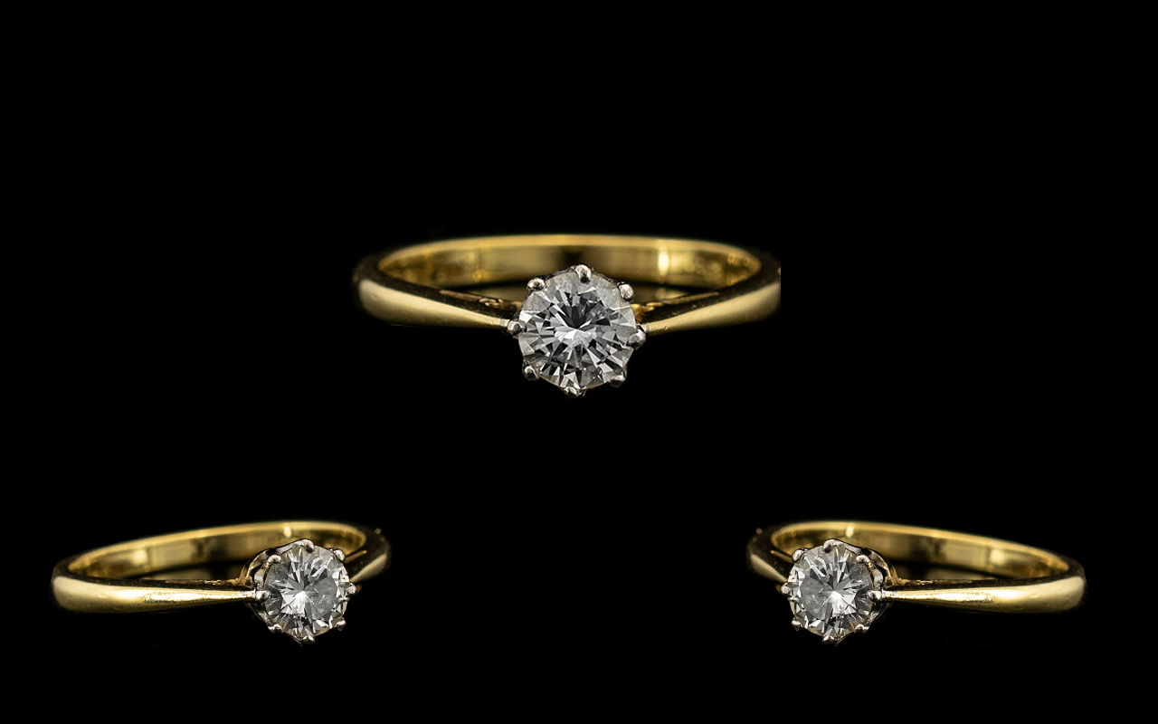 18ct Gold Attractive Single Stone Diamond Ring the round brilliant cut diamond of top quality and