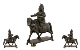 An Antique Japanese Bronze Horse and Rider finely chased on a rectangular base. Height 6 inches.