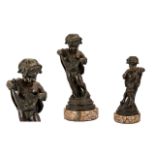 20thC Bronze Sculpture of Putti realistically modelled and raised on a marble base. Height 13