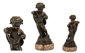 20thC Bronze Sculpture of Putti realistically modelled and raised on a marble base. Height 13