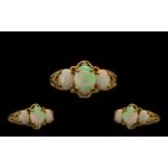 Ladies 9ct Gold Attractive Opal & Diamond Set Dress Ring. Marked for 9.375 to interior of shank. The