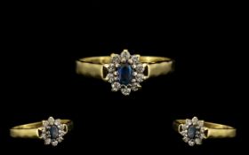 18ct Gold Attractive Sapphire and Diamond Set Cluster Ring flowerhead setting. The central