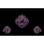 Amethyst and Silver Cluster Ring, a square cut amethyst of 2cts, set on the diagonal,