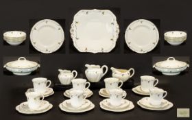 Shelley Limoges Part Set marked Shelley A M M to base, comprising two lidded Tureens, ten cups,