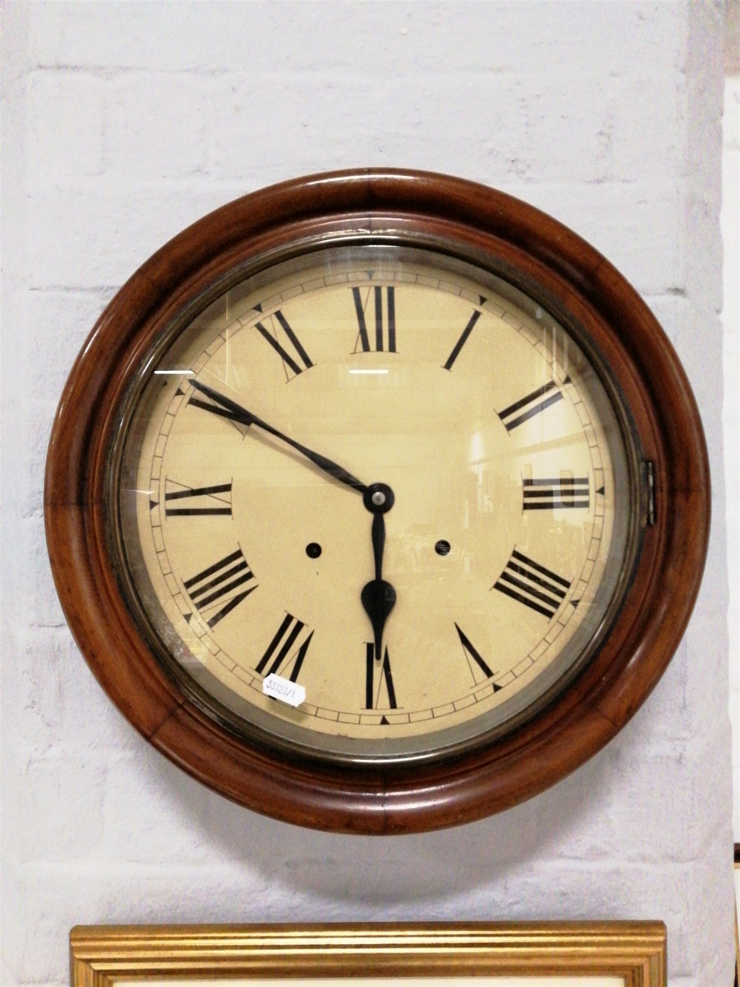 Mahogany cased wall clock.