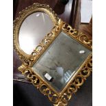 Florentine style gilt wood mirror and oval composition mirror.