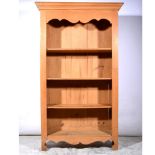 A modern pine full height open bookcase.