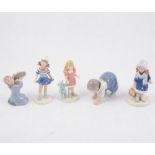 A collection of Danish figurines - B&G cream glazed baby figures 2204/7/8/9,