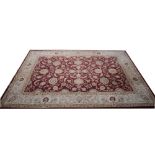 Zeigler pattern rug, burgundy coloured field.