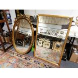 Large gilt framed oval mirror and another modern rectangular mirror