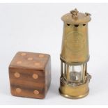 An Eccles brass miners lamp number 6 cased, a reproduction sextant in box, large elm craft made