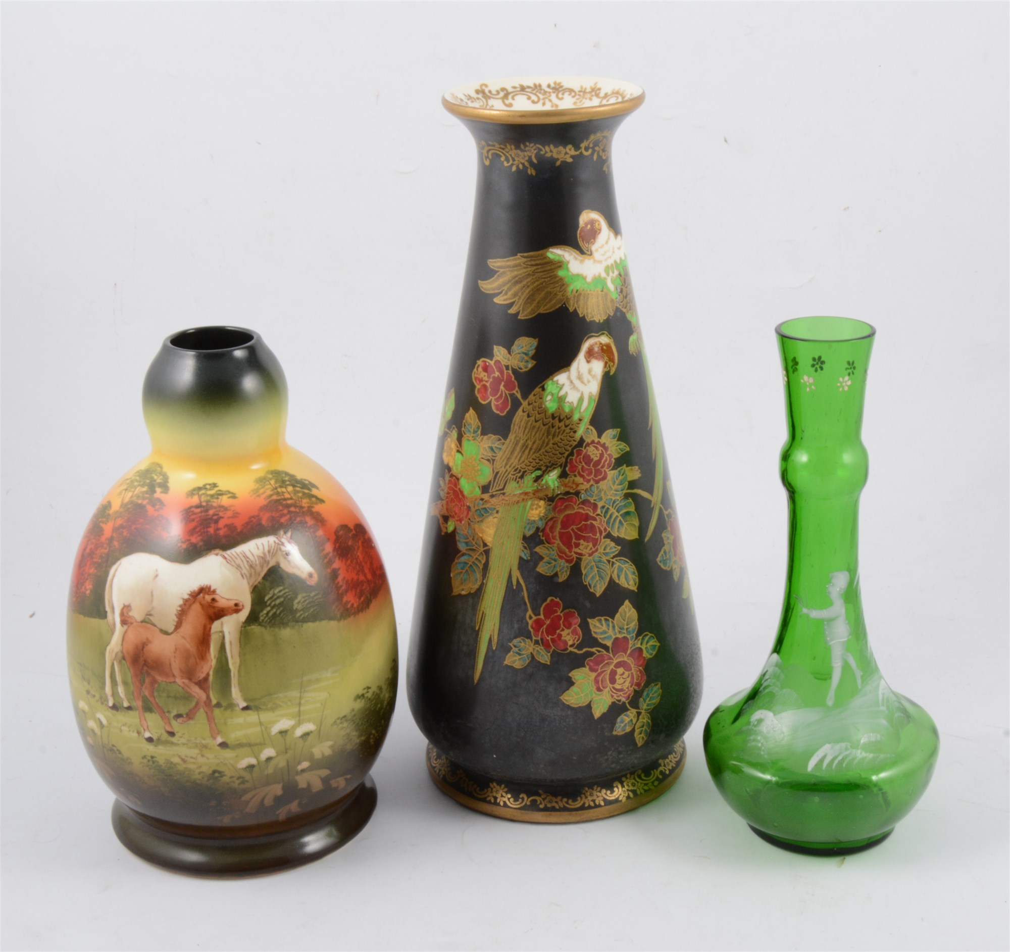 A pair of Crown Devon Soleilian Ware vases decorated with scenes with horses, signed S Fieldhouse,