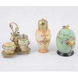 A collection of Crown Devon blush ivory sugar shakers.