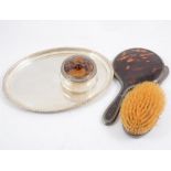 Oval silver engine-turned tray, and silver and tortoise shell part dressing table set