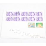 Stamps - an envelope with ten 3 1/2p stamps depicting Princess Anne and Mark Phillips, one stamp