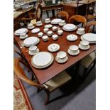 Mahogany drop-leaf table.